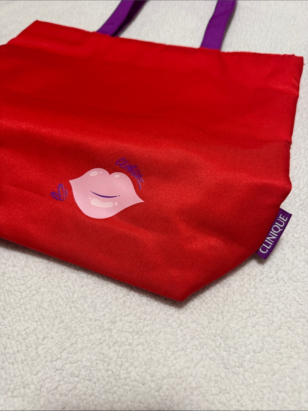 Clinique Red Tote with Purple Handles and Lip Graphic